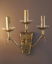 Wall Candleholder In Brass From