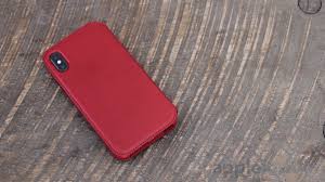 Red iphone 7 and red and blue apple watch strap and apple watches. First Look Iphone X Product Red Leather Folio Case Appleinsider