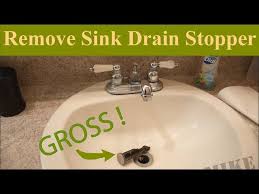 removing a sink drain stopper to unclog