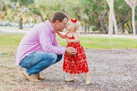 Daughter Kisses Her Dad On The Nose During Family Photos At