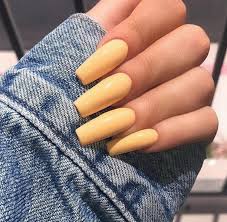 This is a pastel yellow coffin nail design. Acrylic Nails Yellow Coffin Nail And Manicure Trends