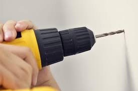 how to drill holes in your wall the