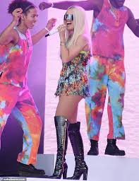 Rita Ora Dazzles The Crowd In A Rainbow Playsuit And Thigh