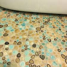 porcelain pebble tile bathroom floor