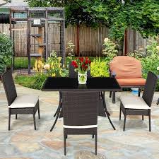 From small bistro sets to garden tables large enough to fit a small army, it's easy to incorporate a outdoor table and chair set into your backyard. Costway 5 Piece Outdoor Patio Furniture Rattan Dining Table Cushioned Chairs Set Aliexpress