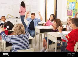 Students and Teacher in Classroom Stock Photo - Alamy