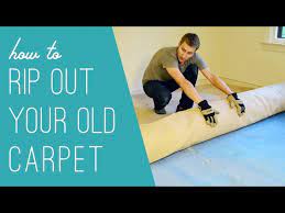how to rip out an old carpet you