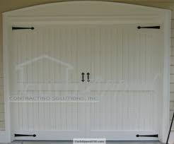 custom wood garage doors installed in