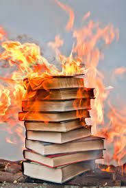 Stack Of Hardcover Burning Books Stock Photo - Download Image Now - iStock