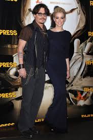 The pirates of the caribbean actor sued the sun 's publisher for libel after the newspaper's executive. Johnny Depp Amber Heard Married Wedding Pictures Celebrity Weddings Glamour