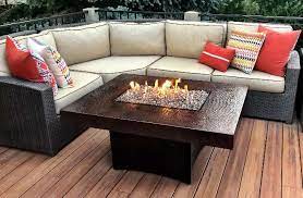 This mini fire bowl can fit on your smallest of tables and still provides enough heat to roast marshmallows. Oriflamme Rectangle Gas Fire Pit Table Hammered Copper