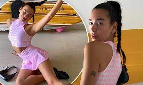 Dua Lipa poses in a tiny pink crop top and mini skirt combo for new  sizzling snaps | Daily Mail Online