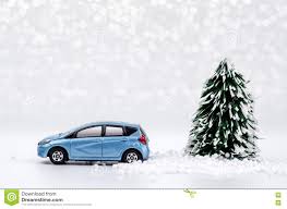 Christmas Tree And Blue Car With Lights Snow Winter