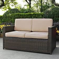 sand and brown wicker patio furniture