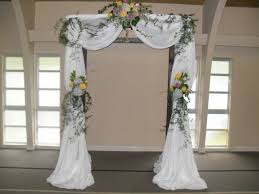 Every detail was carefully considered, vivid flowers, thick rattan, 3d printed eucalyptus, with buds, extremely realistic looking! Photo Gallery Photo Of Arch Rentals With Beautiful Flowers Indoor Wedding Arches Wedding Arch Rustic Wedding Arch