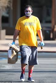 What ultimately wins the audience over, though, is the very same thing that's behind sandler's occasionally stunning film performances: Adam Sandler Picks Up Takeout But Stays Protected In A Mask And Gloves Sound Health And Lasting Wealth