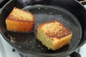 Crumble a pie slice section of cornbread into the skillet. Yes I Fried Leftover Cornbread In Bacon Fat The Amateur Gourmet