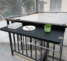 Sometimes you want to sit with a book and a cup of coffee on your balcony, other times you want to move around and water your plants or do some yoga. Balcony Hanging Table Folding Adjustable Railing Dining Side Table Suitable For Most Patio Railings 2 Sizes Black 80 40cm Buy Online In United Arab Emirates At Desertcart Ae Productid 203525663
