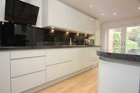 white contemporary kitchen with granite