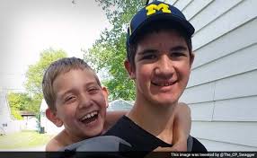 boy completes 57 mile walk with brother