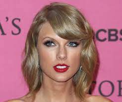 taylor swift wears red lipstick to