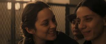 A Polish woman named Ewa Cybulska, played by Marion Cotillard, and her sister, Magda Cybulska, played by Angela Sarafyan, come to Ellis Island, ... - the-immigrant-magda-and-ewa-arrive-in-america