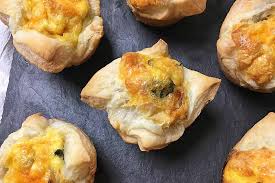 mini breakfast quiches with a puff
