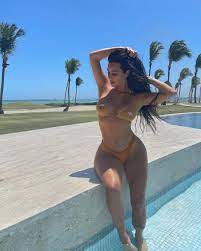 Kim Kardashian stuns in a barely-there peach bikini with cheeky emojis  after ex Kanye Wests getaway with Irina Shayk | The Irish Sun