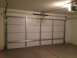 strut your stuff garage door man