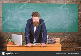Teacher Strict Serious Bearded Man Lean On Table Chalkboard