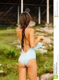 Beautiful Girl Undress Full Swimsuit. Stock Photo - Image of resort, model:  94711076