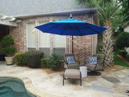 a bright blue cantilever umbrella from