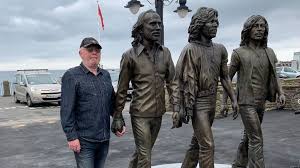 Bee gees official music video for how deep is your love from the saturday night fever soundtrack, now remastered in hd. Isle Of Man Bee Gees Statue Unveiled On Douglas Seafront Bbc News