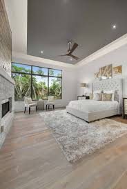75 light wood floor bedroom with gray