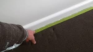 how to remove masking tape from carpets