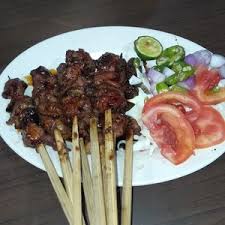 Menu favorit saya ayam goreng dan beras dalam bentuk cair (beras kencur). R M Sate Solo Pak Budi Ratu Jaya Food Delivery Menu Grabfood Id