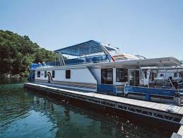 Woodworker builds the perfect tiny house boat for life on the water. 77 Foot Presidential Houseboat