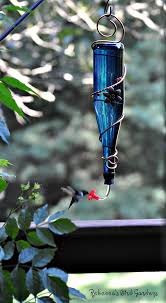 blue wine bottle hummingbird feeder
