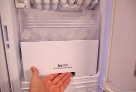 This style of icemaker is mounted sideways at the top of the freezer compartment and is covered by a door flap. Fix A Leaking Fridge And Other Common Refrigerator Problems Here S How Cnet