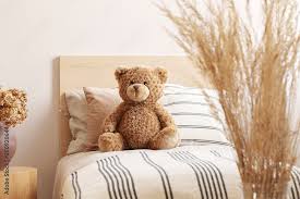 Brown Cute Teddy Bear On Single Wooden