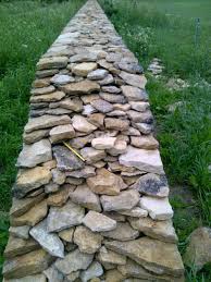 A Cotswold Dry Stone Wall Or Fence