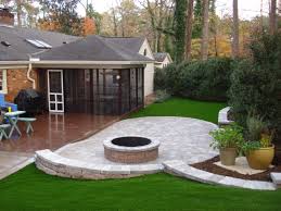 Synthetic Grass And Grotto Hardscapes