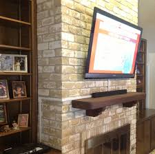 Tv Wires Over A Brick Fireplace