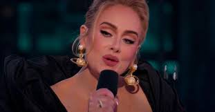 adele debuts shocking plumped up pout