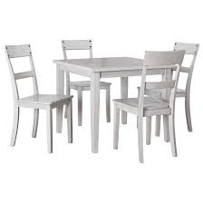 The dining table and chairs showcase a beautiful contrast of a stark white base with a natural woodgrain tabletop and seating. Ashley Signature Design Loratti 5 Piece Square Dining Table Set Rooms And Rest Dining 5 Piece Sets