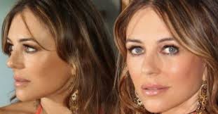 liz hurley poses in plunging as