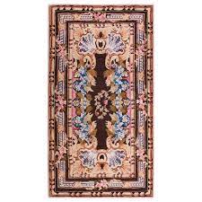 antique axminster rug at