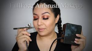a bronze airbrush makeup look using