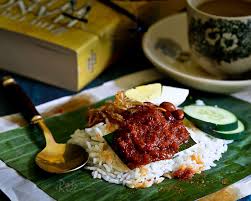 Check spelling or type a new query. Nasi Lemak Bungkus Coconut Flavored Rice With Spicy Anchovies Wrapped In Banana Leaves Roti N Rice