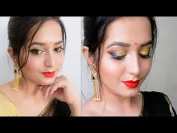 glam black golden eye makeup look for